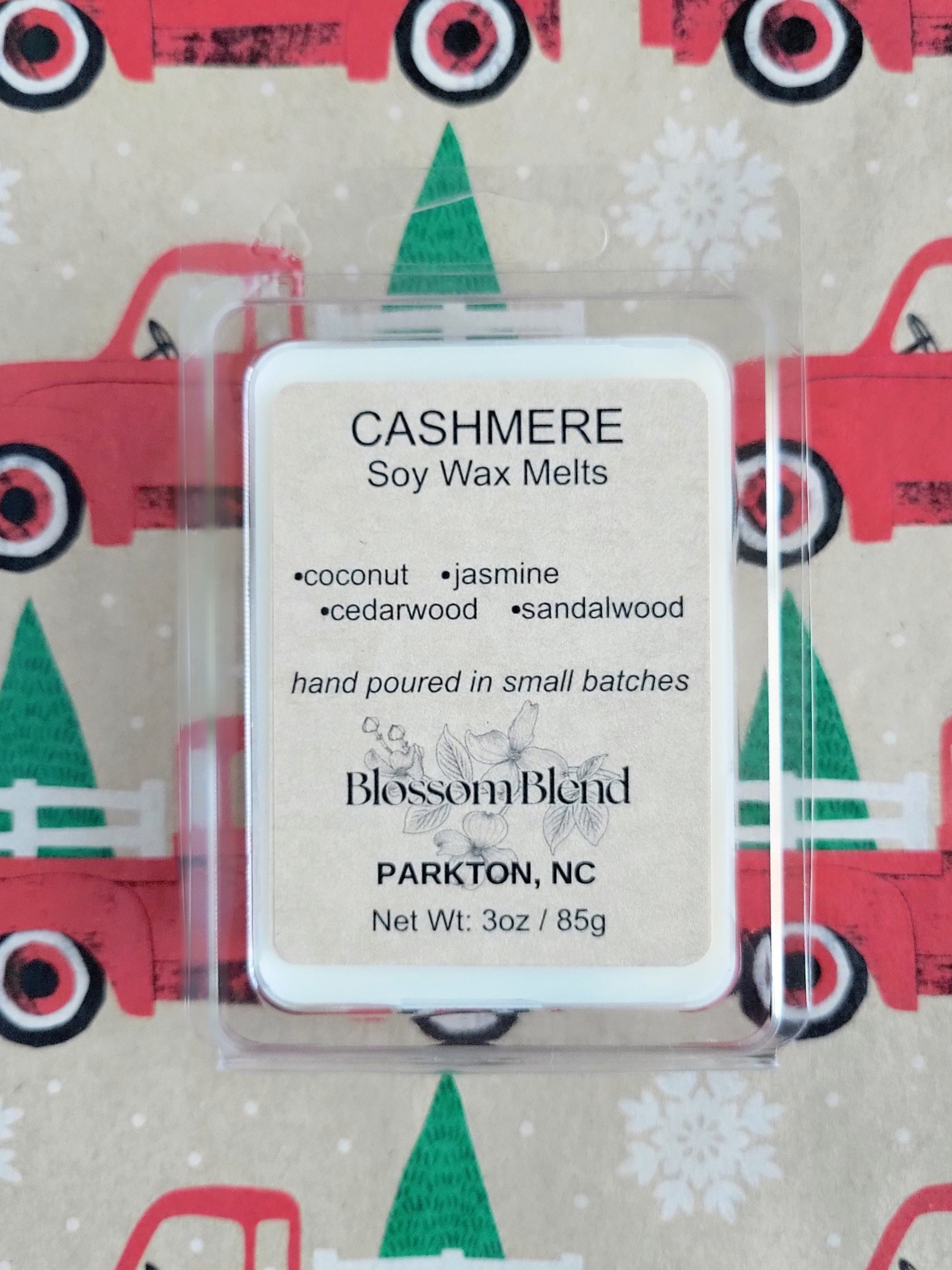 Cashmere soy wax melts packaging with a festive background