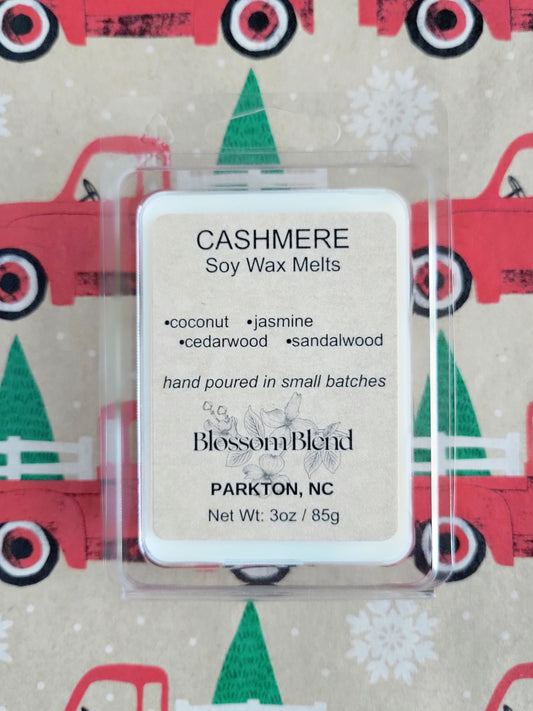 Cashmere soy wax melts packaging with a festive background
